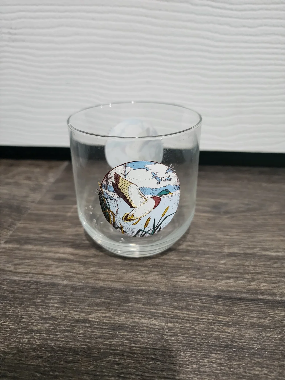 Vintage lowball / rocks glass featuring duck decal